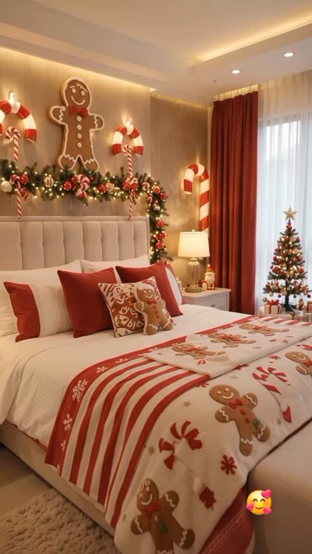 Christmas themed bedroom with red curtains matching the gingerbread man bedding and decor.