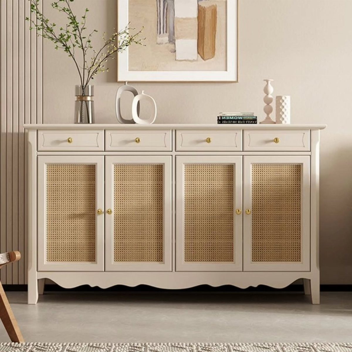 Cream sideboard with cane doors and decorative objects against a neutral wall.