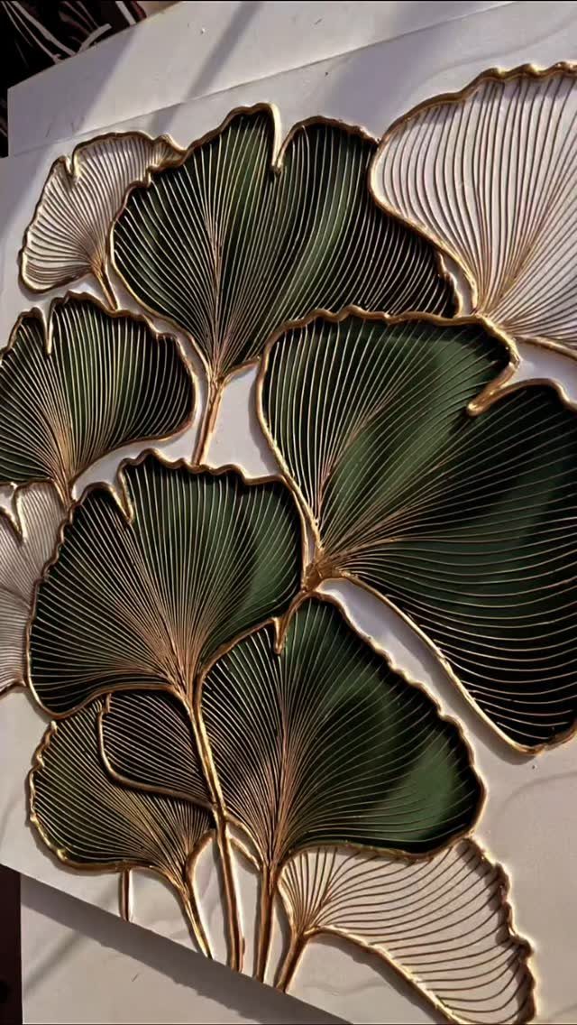 Ginkgo leaf artwork with green and cream tones and gold metallic outlines.