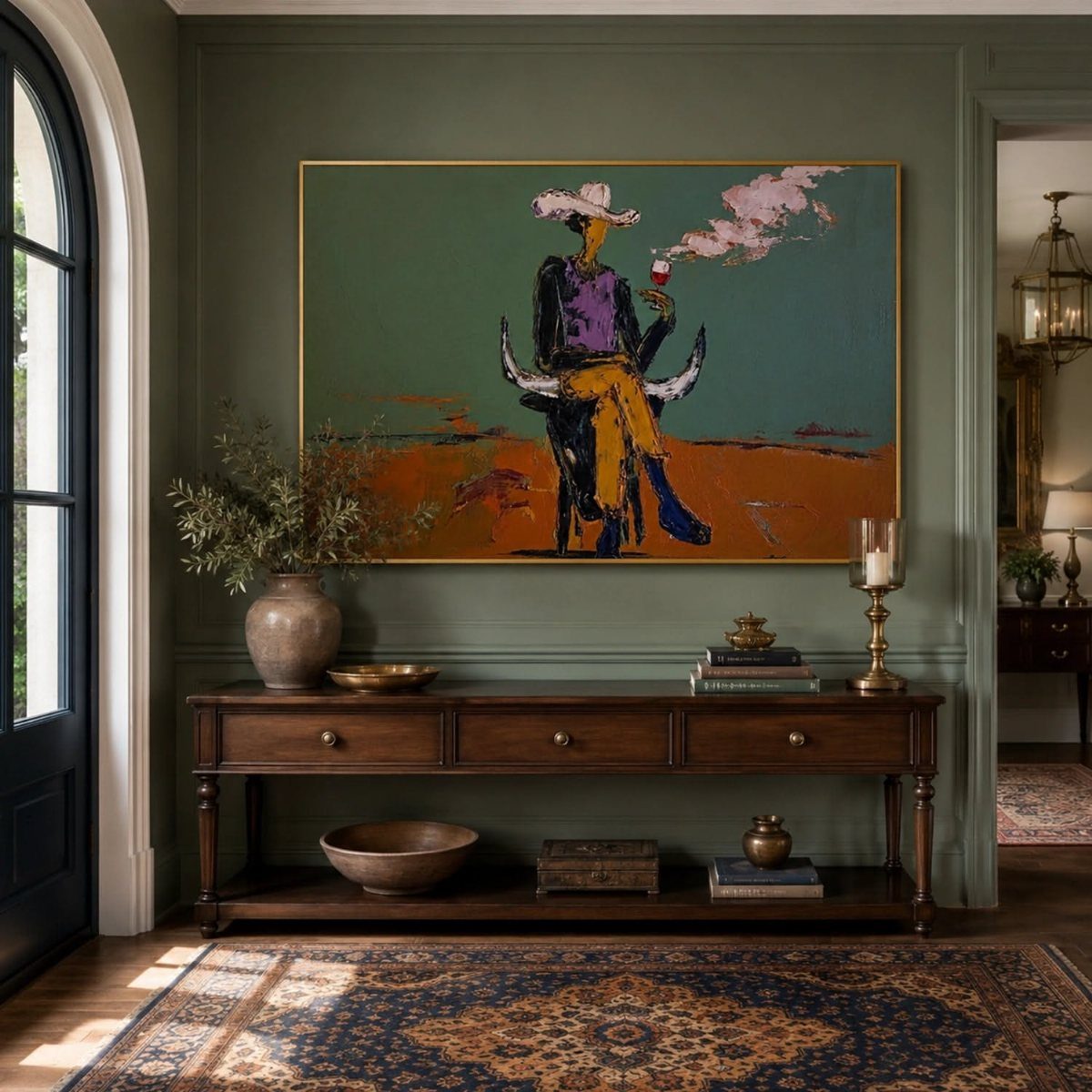 Large canvas painting of a stylized figure hanging above a wooden console table