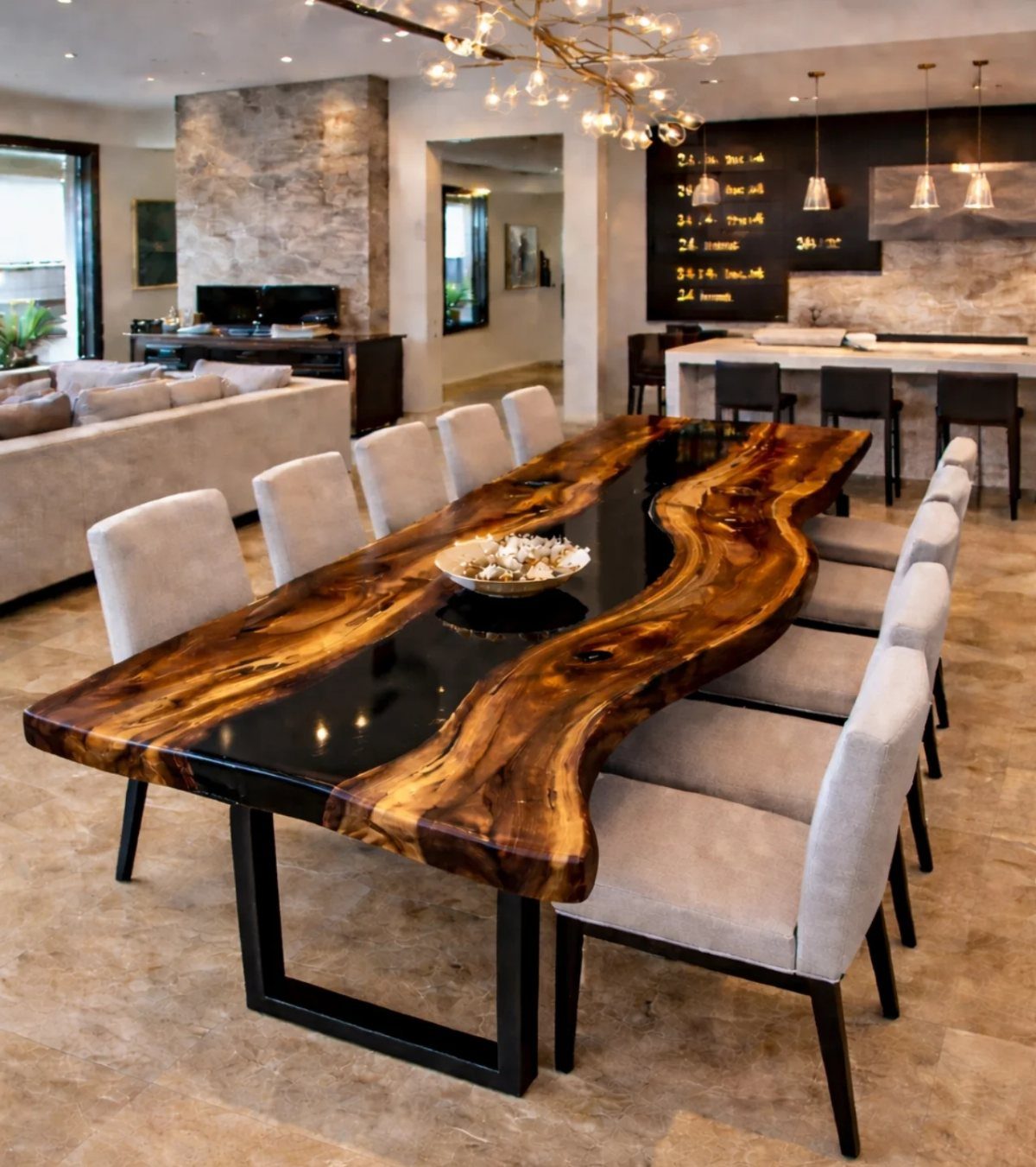 Live edge wood slab dining table with resin river in open concept room